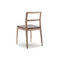 ALKI Chair in oak / walnut - naked back and seat in fabric / leatherの写真